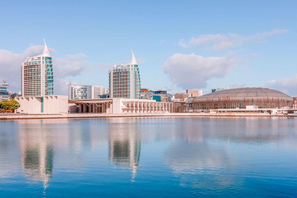 Portuguese Pavilion, Atlantico or MEO Arena with Sao Gabriel (L) and Sao Rafael (R) Towers seen across the Olivais Dock. Park of Nations, Lisbon, Portugal